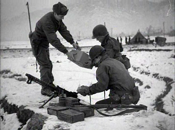 U.S. Soldiers receive Christmas packages during the Korean War, 1950.