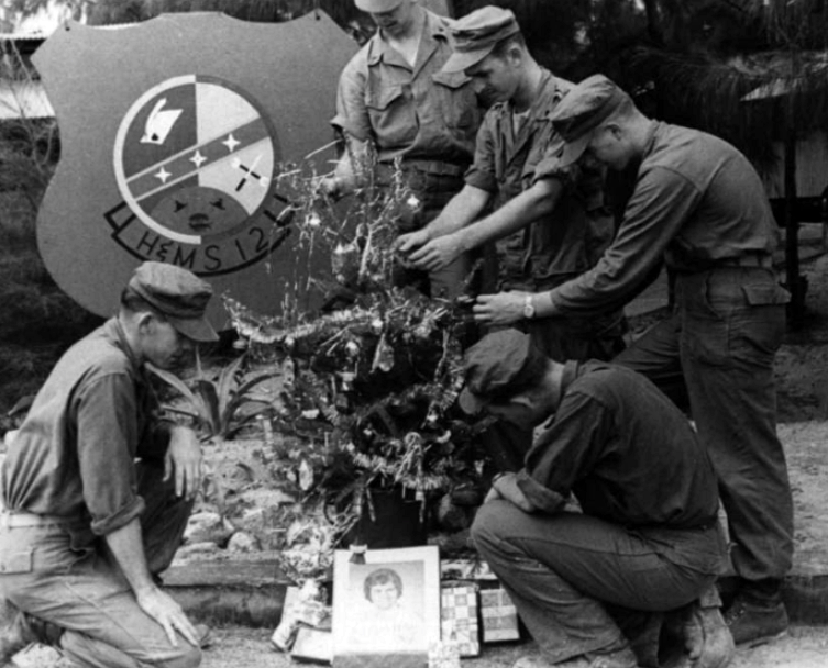 Marines in Vietnam decorate a Christmas tree, 1967.