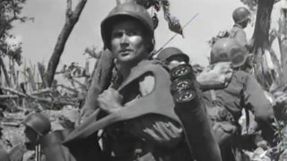 The Invasion of Angaur Island in World War II World War II soldier carrying a large load of equipment
