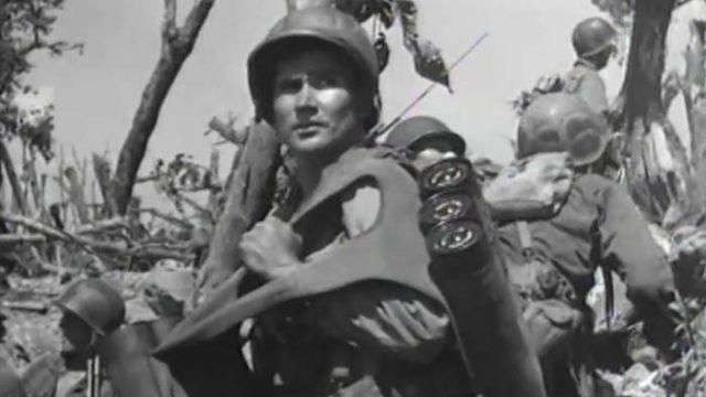 The Invasion of Angaur Island in World War II World War II soldier carrying a large load of equipment
